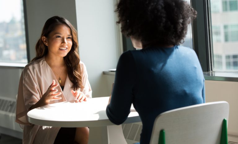 Two employees talking