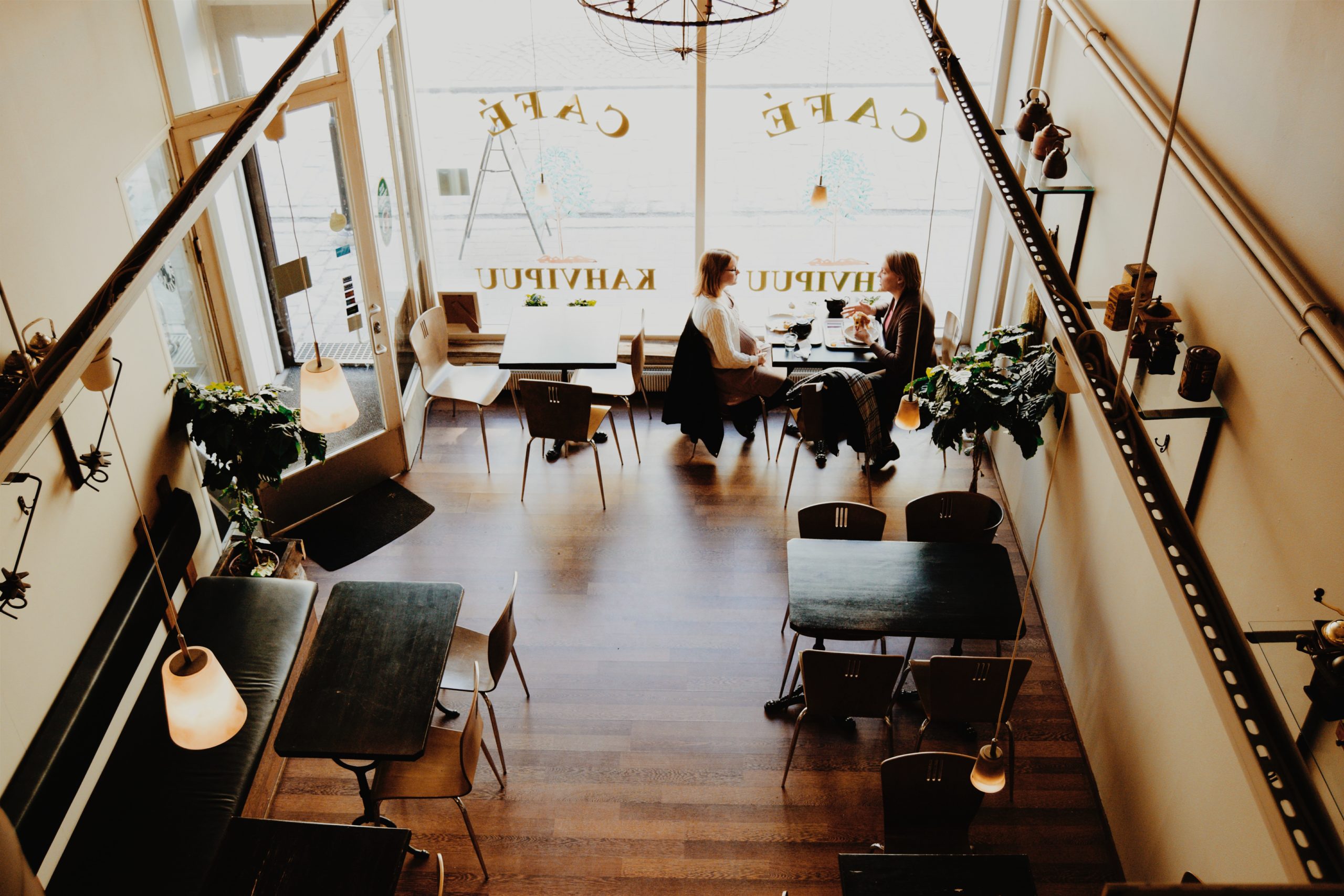 Two people in a cafe