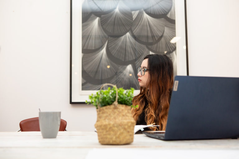 A woman using a laptop